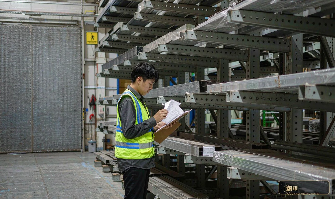 Sheet metal stockyard and purchasing area — material decisions drive cost sensitivity