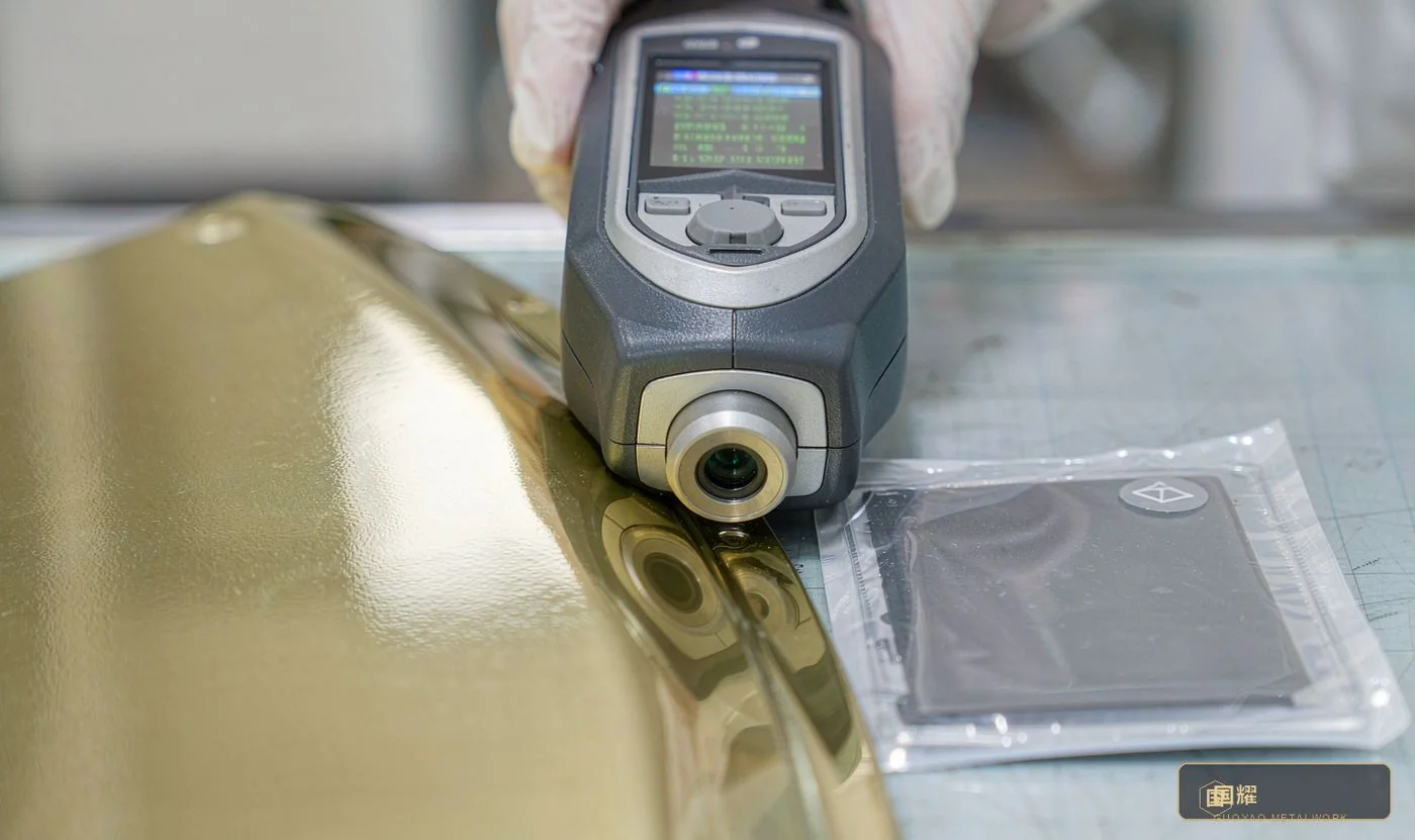 Close-up of a spectrophotometer compared against a sealed colour sample