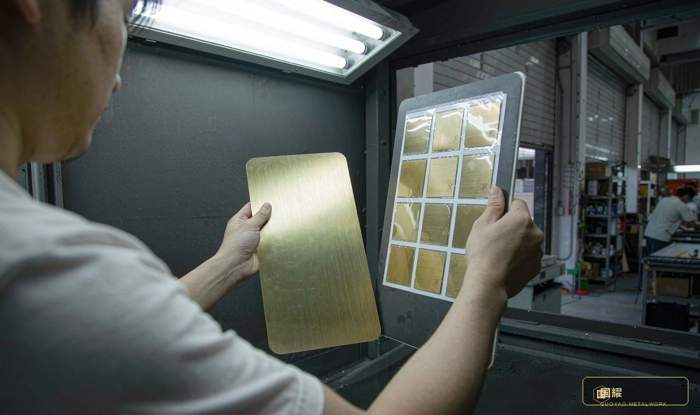 Sealed colour boards compared under a standard light booth