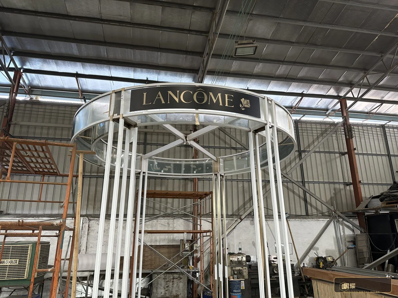 White elliptical portal frame standing complete in the hall