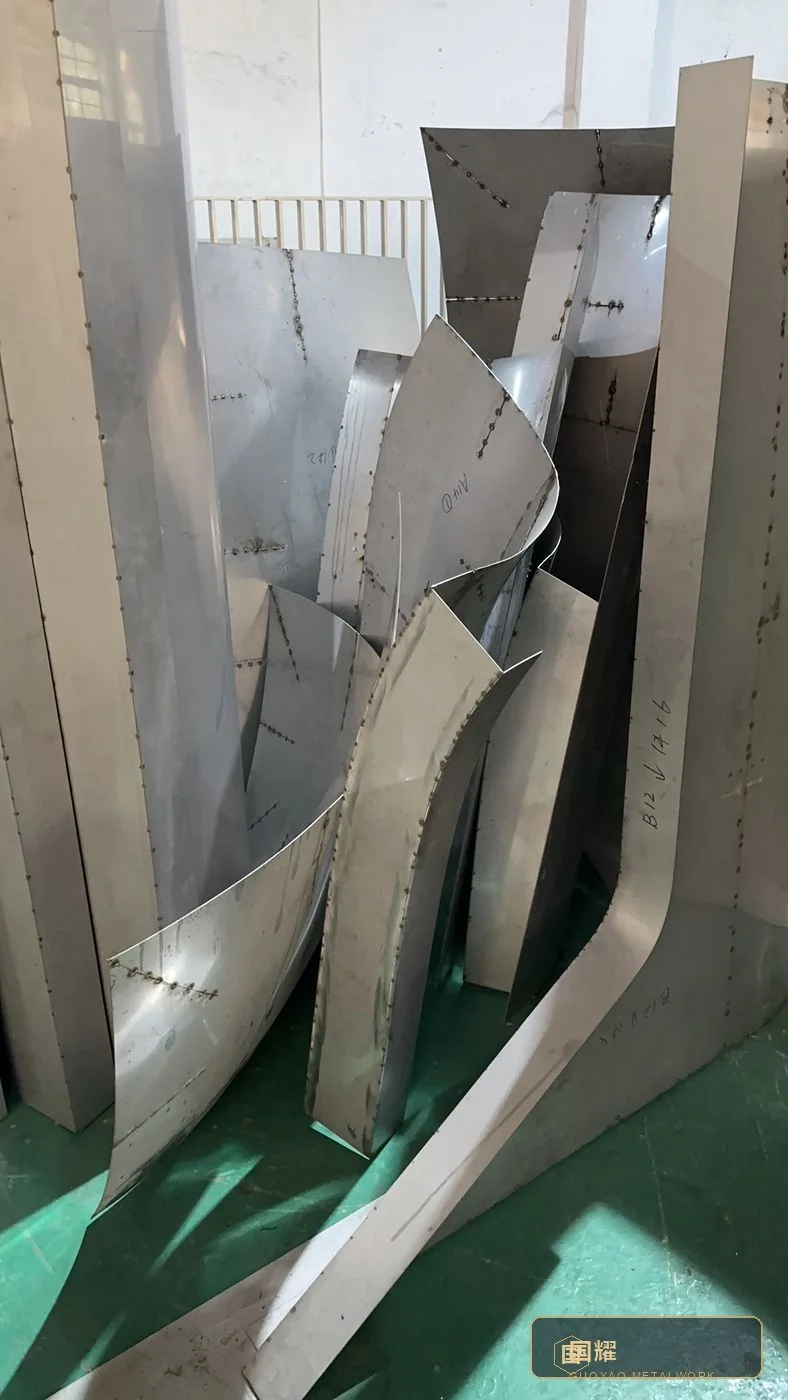 Formed segments stacked in the fabrication bay