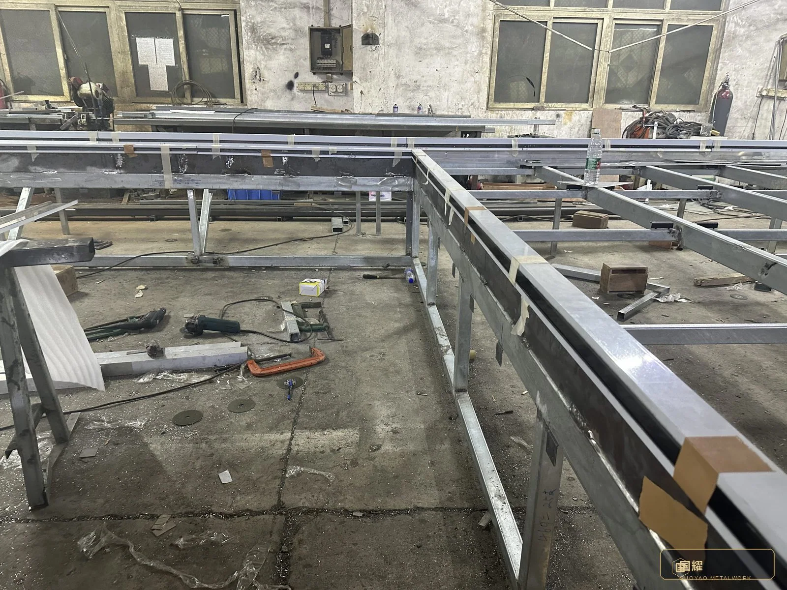 Squaring and welding a frame bay.