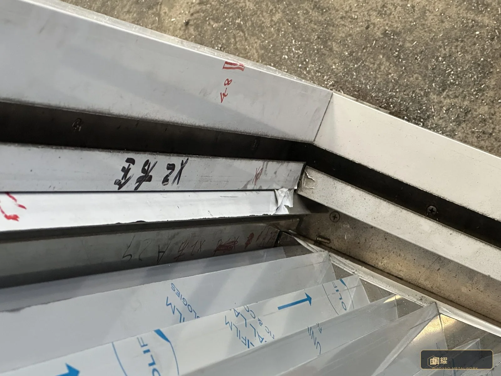 Module tags checked against the packing list during trial — the same numbers the site crew will see a month later.