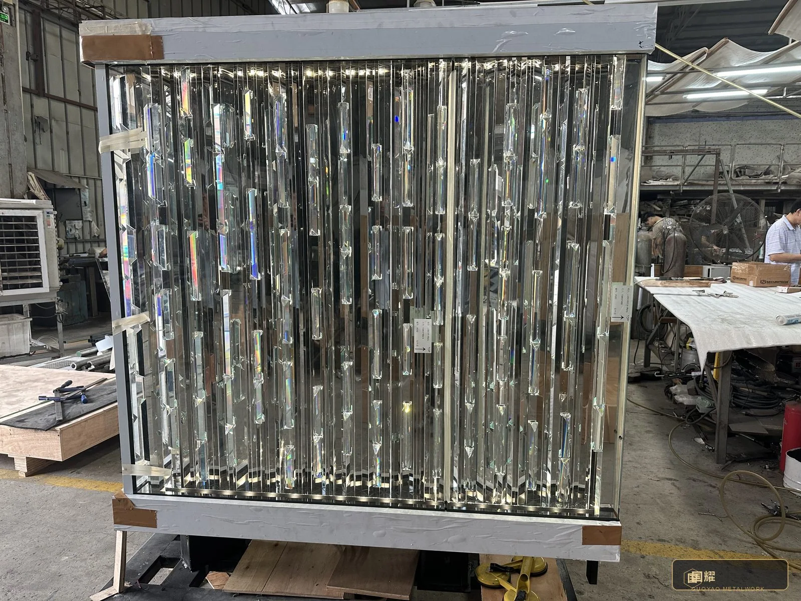 Cassettes mounted in their carrier wall, each positioned to match the grid on the drawing.