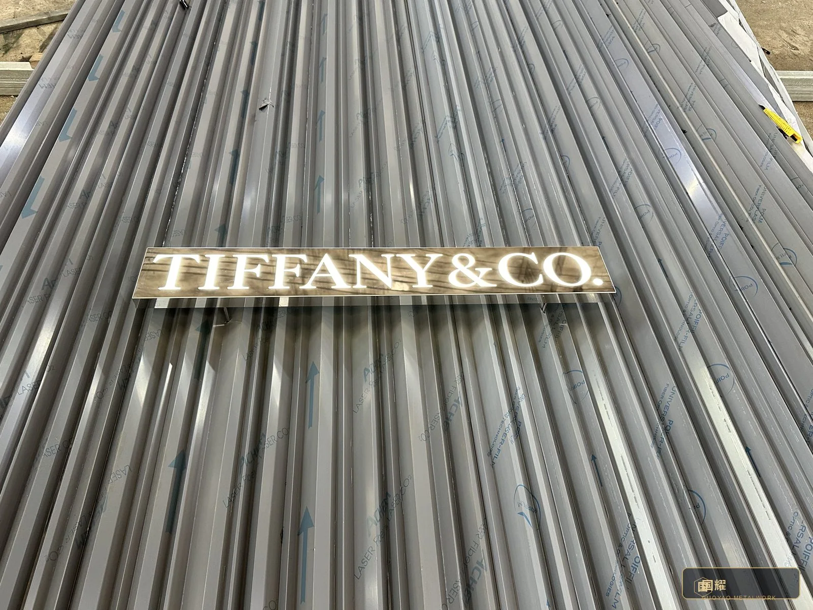 The finished illuminated lettering, complete and signed off, before packing in its own crate with the fixing jig.