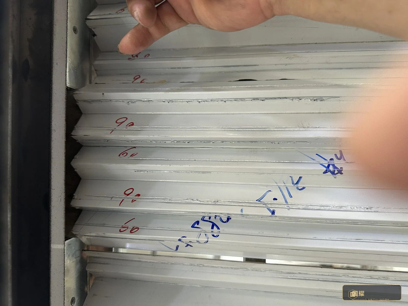 Module marks cross-checked against the packing list: what the drawing says, what the workshop did, and what the crate will contain are one and the same.