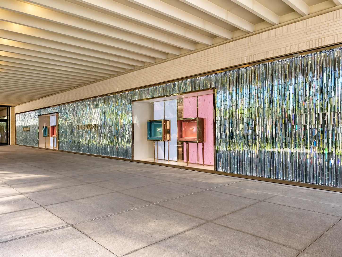 The completed wall run after commissioning, the glow even from end to end — the workshop's numbers, verified in architecture.